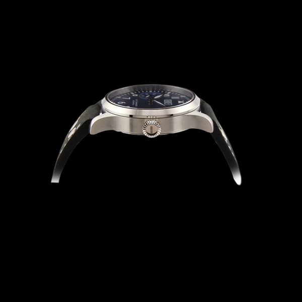 Wristwatch with black face and silver case on a black background